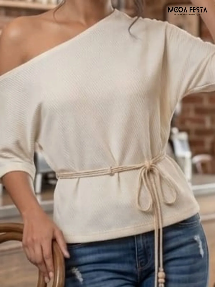 Off-shoulder ribbed knit top with a matching waist tie
