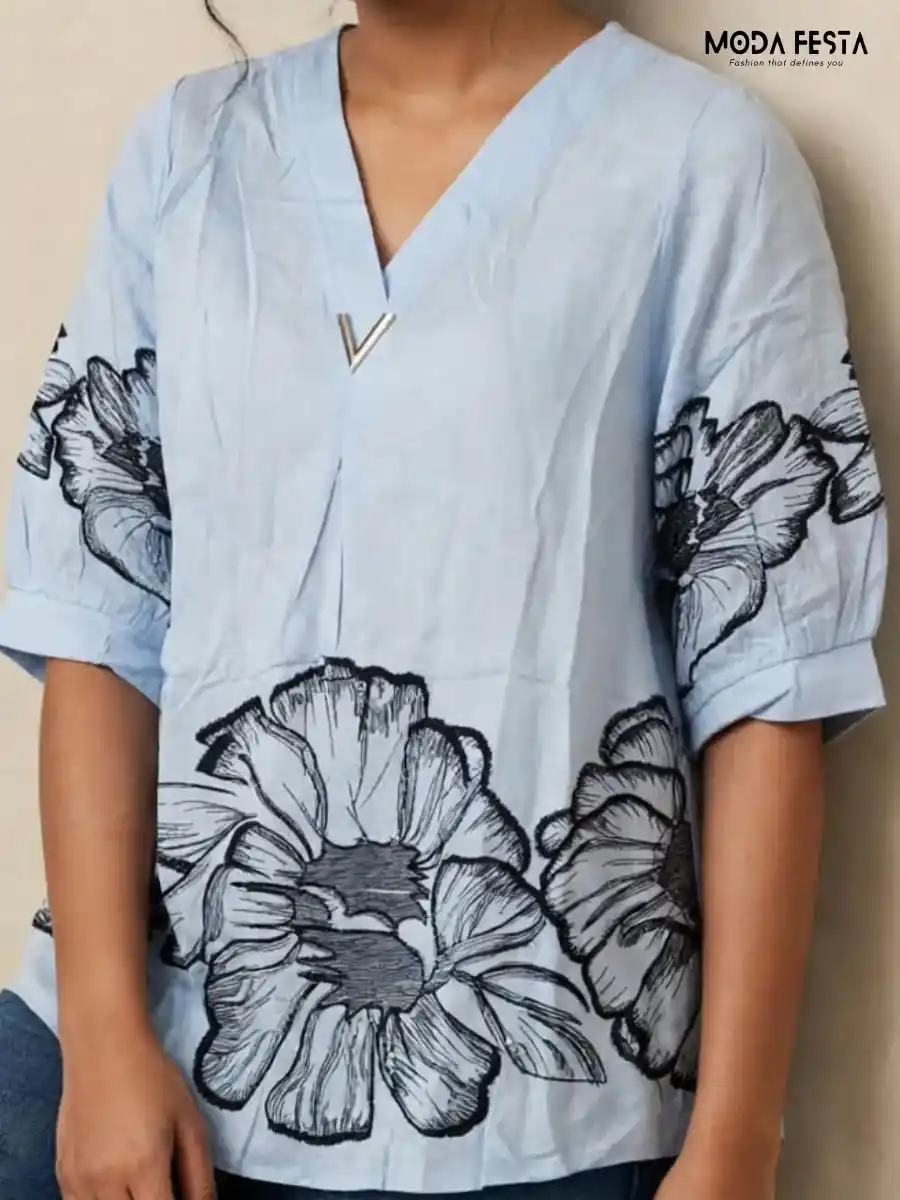 ModaFesta -light-blue-oversized-floral-print-top
