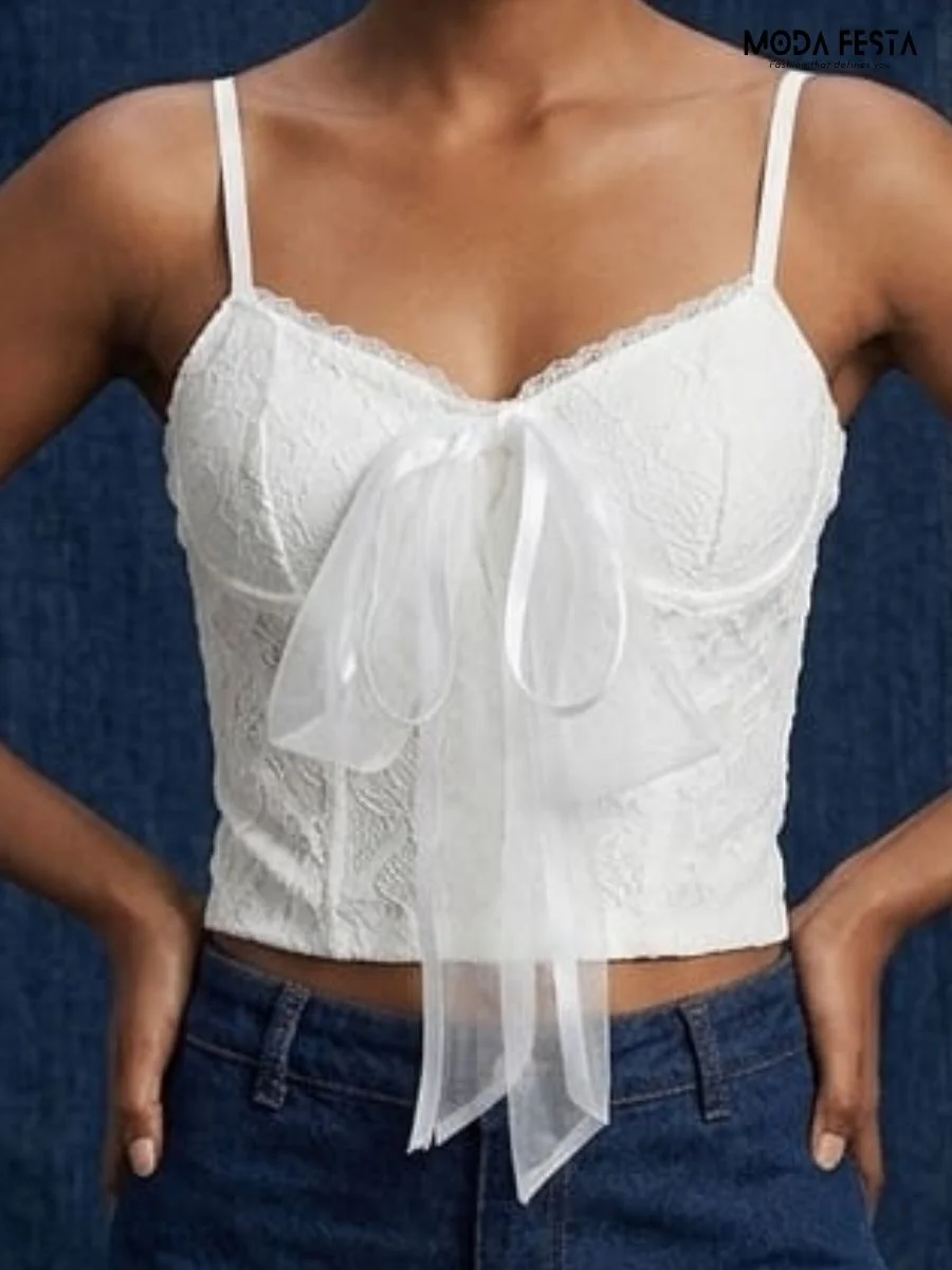 white lace corset top with a tulle bow detail